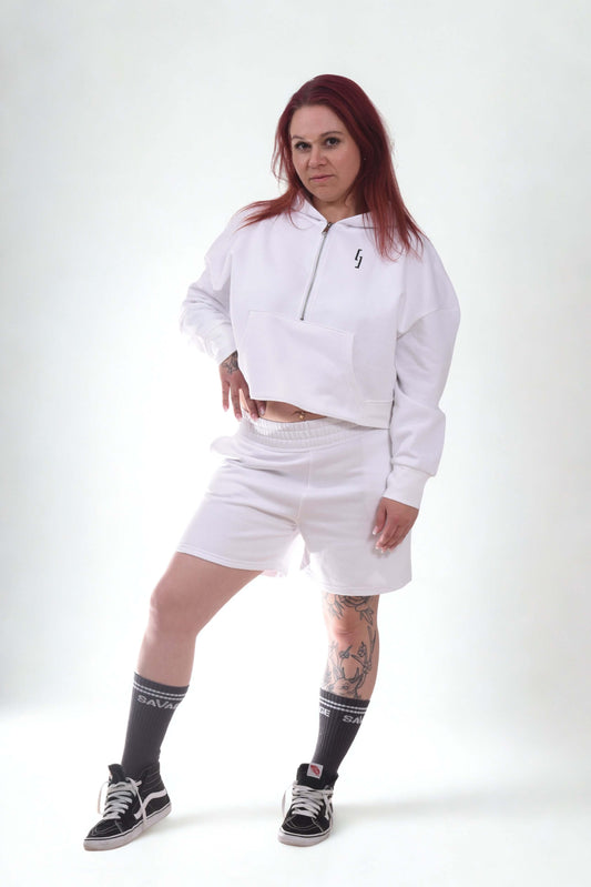 Model wearing ATHLETIC COMFORT ZIP hoodie in white, showcasing gym-to-street style and athletic comfort.
