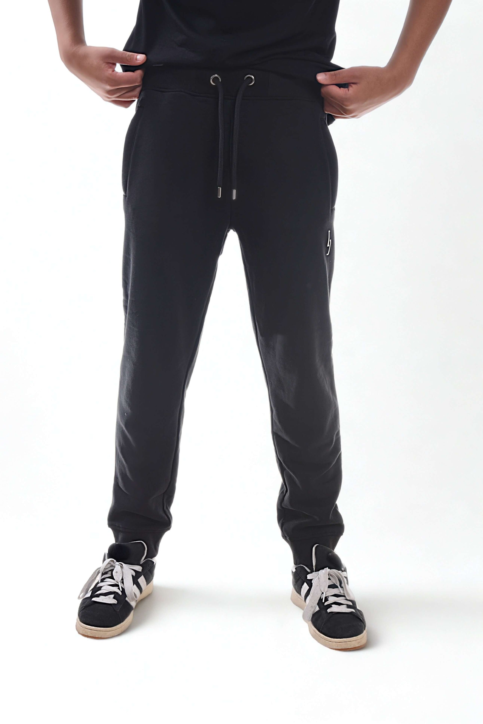 Heavyweight joggers - RAW LINE in black, featuring a comfortable fit and durable fabric.