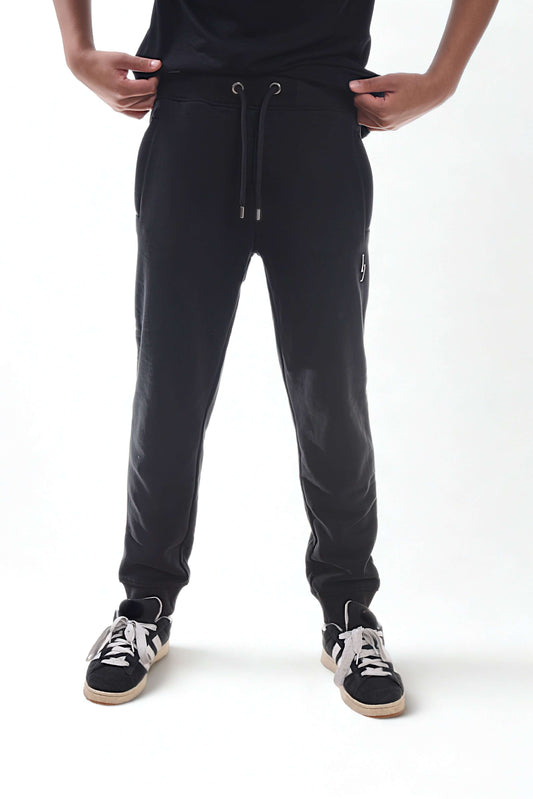Heavyweight joggers - RAW LINE in black, featuring a comfortable fit and durable fabric.