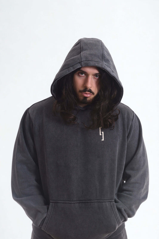Man wearing vintage heavy hoodie men with a hood, showcasing casual streetwear style.