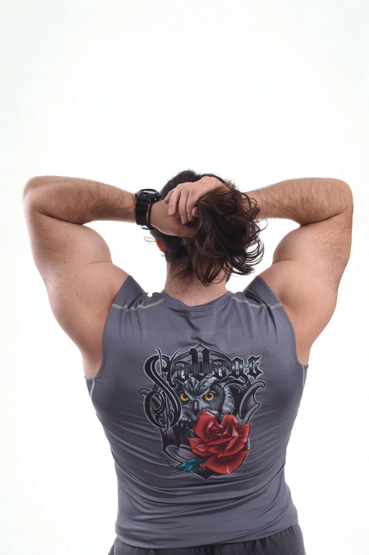 Man wearing vintage compression tanktop with graphic design, showcasing back and muscular arms.