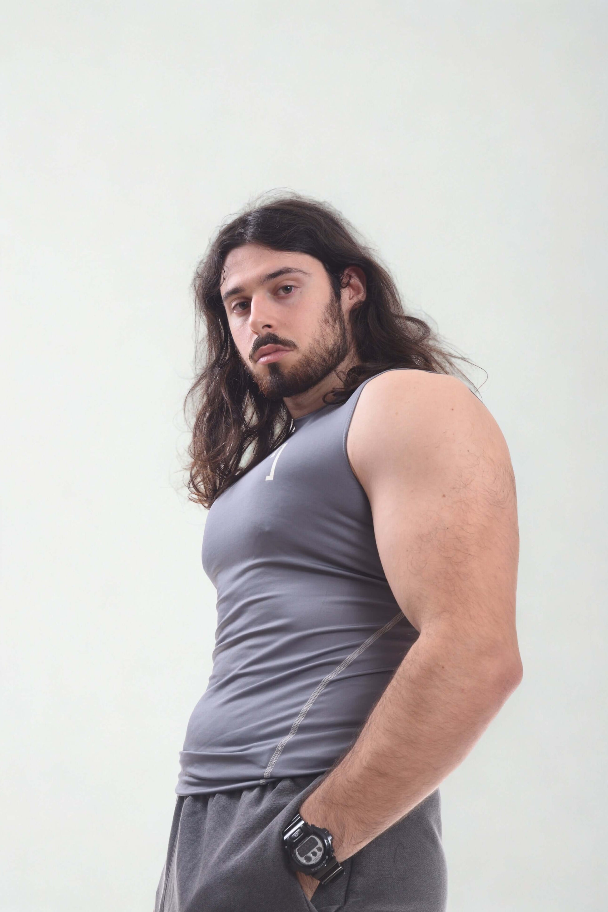 Vintage compression tanktop Krow Line worn by a model showing off its fit and design.