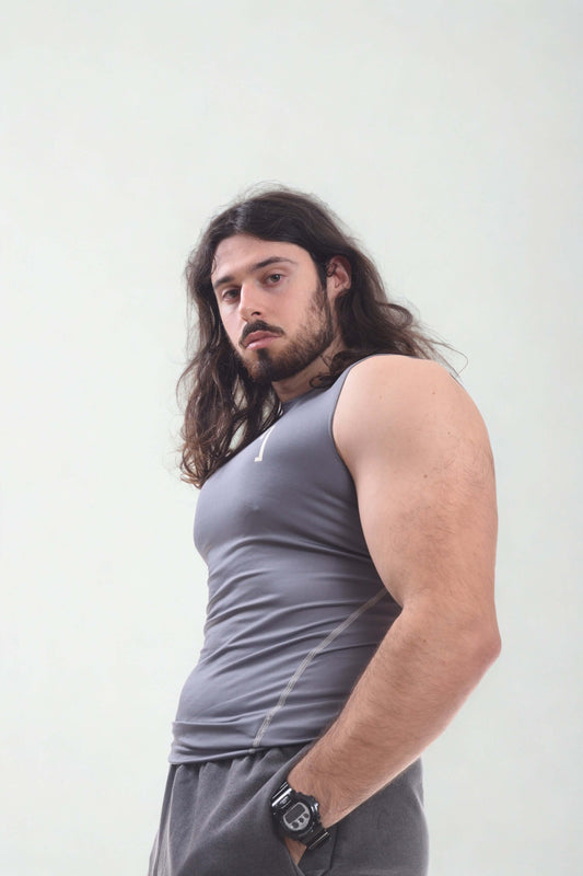 Vintage compression tanktop Krow Line worn by a model showing off its fit and design.